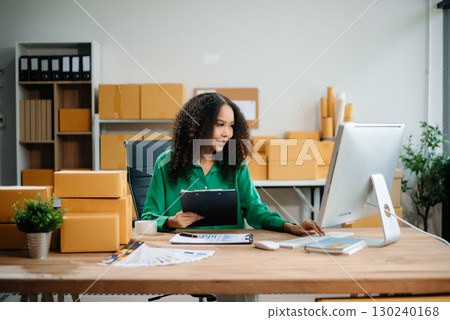 eelance woman working at home office, BOX,tablet and laptop online, marketing, packaging, delivery,  e-commerce concept 130240168