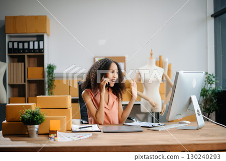 eelance woman working at home office, BOX,tablet and laptop online, marketing, packaging, delivery,  e-commerce concept 130240293