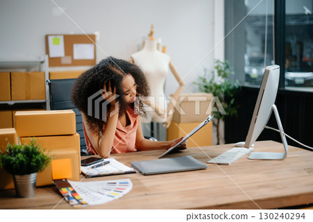 Young Asian owner woman prepare parcel box woman is stressed, bored, and overthinking from working Young Asian owner woman prepare parcel box woman is stressed, bored, and overthinking from working 130240294