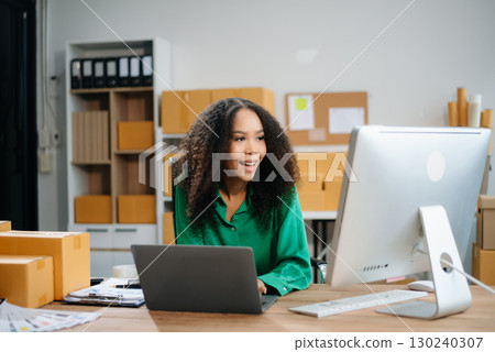 eelance woman working at home office, BOX,tablet and laptop online, marketing, packaging, delivery, e-commerce concept eelance woman working at home office, BOX,tablet and laptop online, marketing, packaging, delivery, e-commerce concept 130240307