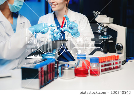 Dctor work on digital tablet healthcare doctor technology tablet using computer in laboratory study with virtual icon 130240543