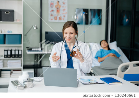 Woman doctor phone call, healthcare talking and medical service writing sick note, surgery planning and prescription. 130240661