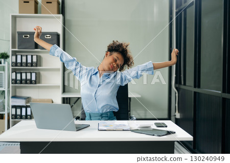 Overworked young Asian businesswoman office worker suffering from neck pain after had a long day Overworked young Asian businesswoman office worker suffering from neck pain after had a long day 130240949