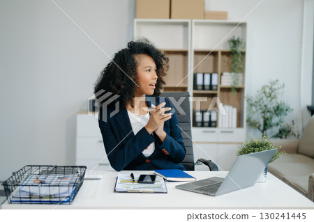 Overworked young Asian businesswoman office worker suffering from neck pain after had a long day Overworked young Asian businesswoman office worker suffering from neck pain after had a long day 130241445