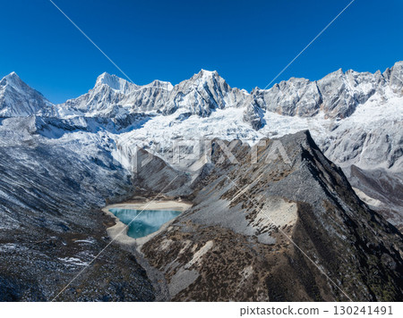 Aerial view of beautiful snow capped mountain and lake landscape in Tibet, China 130241491