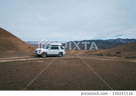 Toyota 4runner on high altitude mountain top in Tibet ,China Toyota 4runner on high altitude mountain top in Tibet ,China 130241516
