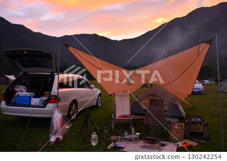 Camping in the car with your dog 130242254