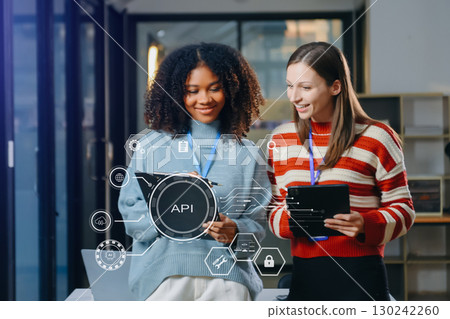API Application Programming Interface, woman using laptop, tablet and smartphone with virtual screen API icon Software development tool, modern technology API Application Programming Interface, woman using laptop, tablet and smartphone with virtual screen API icon Software development tool, modern technology 130242260