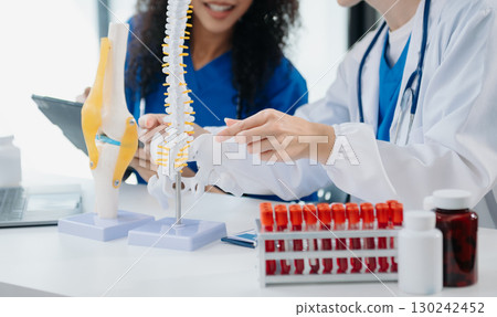 Modern Medical Research Laboratory Portrait of Two African American Scientists Working, Using Digital Tablet, Analyzing Samples, Talking. Modern Medical Research Laboratory Portrait of Two African American Scientists Working, Using Digital Tablet, Analyzing Samples, Talking. 130242452