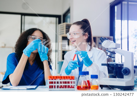 Scientist two woman with tablet and laptop, laboratory and ecofriendly science. Agriculture, research and scientists with online reading, test samples Scientist two woman with tablet and laptop, laboratory and ecofriendly science. Agriculture, research and scientists with online reading, test samples 130242477