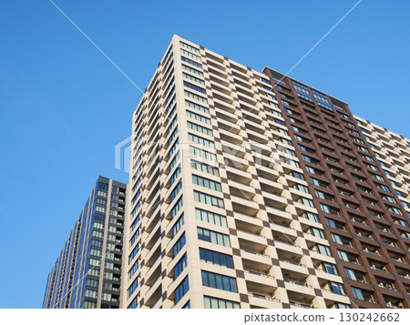 High-rise apartment building shining against the blue sky | Ariake 130242662