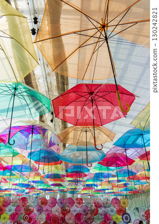Colorful umbrella sky 130242821