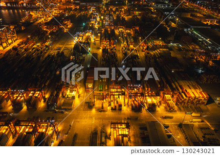 Aerial view of Yantian international container terminal at night in Shenzhen city, China Aerial view of Yantian international container terminal at night in Shenzhen city, China 130243021