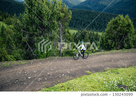 Riding mountain bike in beautiful forest mountain 130243099