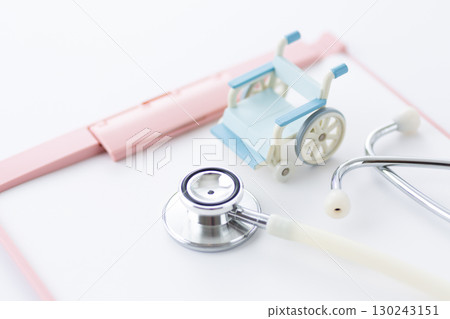Stethoscope, binder and wheelchair 130243151