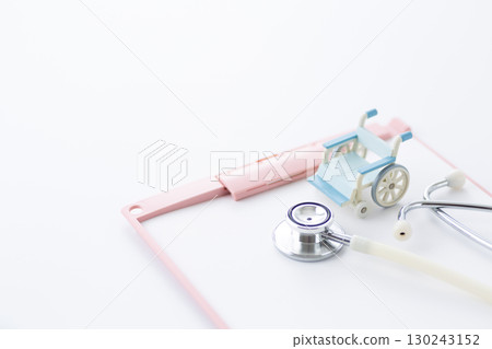 Stethoscope, binder and wheelchair 130243152