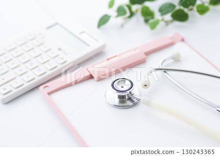 Stethoscope, binder and calculator 130243365