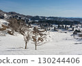 Snow-covered rice terraces and a clear blue sky 130244406