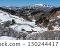 Snow-covered rice terraces and snow-capped mountains 130244417