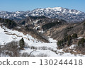 Snow-covered rice terraces and snow-capped mountains 130244418