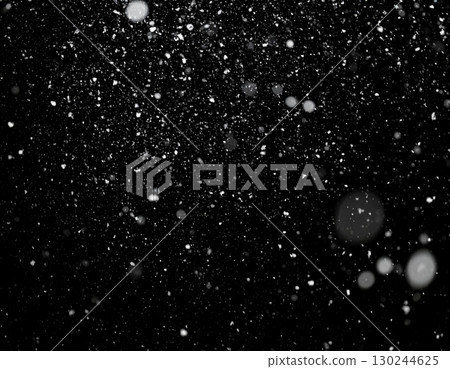 AI-generated image of snow falling on a black background. 130244625