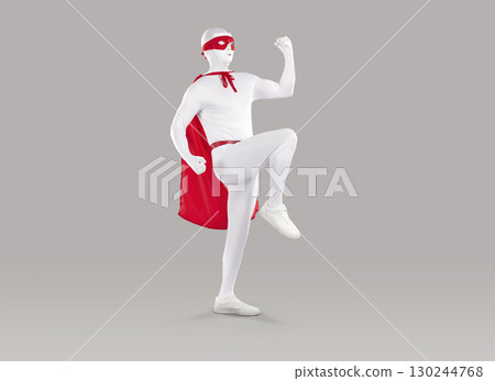 Mysterious superhero man in white skin tight bodysuit posing confidently 130244768