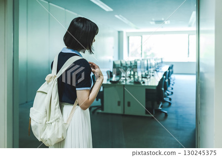 A woman touring the facility 130245375