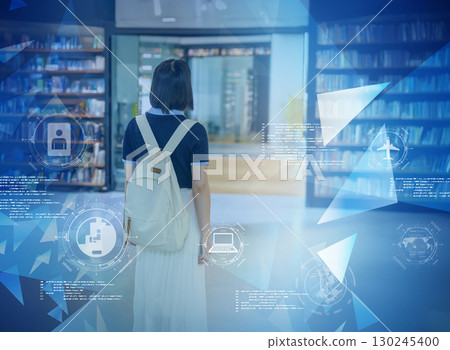 Female university student entering the library Female university student entering the library 130245400