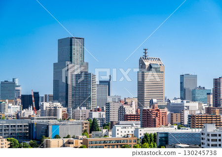 A panoramic view of the skyscrapers in central Sendai (Trust Tower and SS30) from the grounds of Atago Shrine, the main shrine of Sendai. 130245738