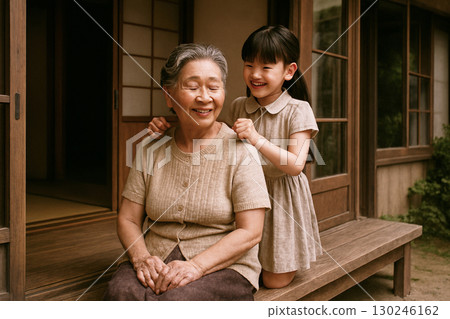 A Showa-era scene: Grandson patting shoulders on the veranda A Showa-era scene: Grandson patting shoulders on the veranda 130246162