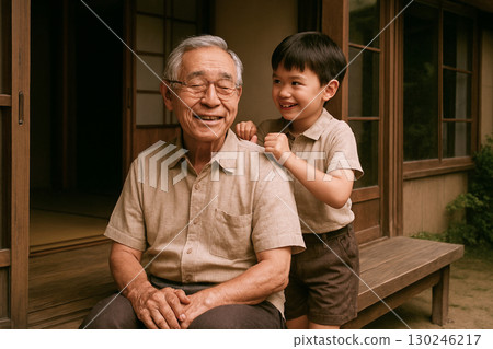 A Showa-era scene: Grandson patting shoulders on the veranda 130246217