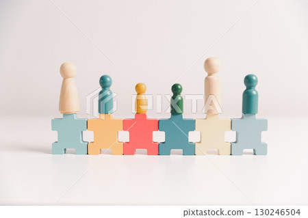 Concept of diversity, inclusion, equality is highlighted in team setup, wooden elements, symbolizing leadership, authority, influence, strong communication skills, inclusive organizational structure. 130246504