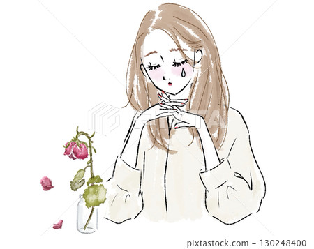 A sad, crying woman with a withered rose and her chin resting on her hand 130248400