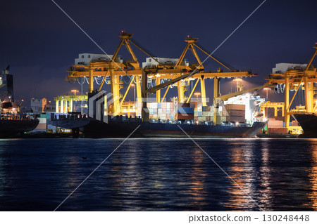 Crane and cargo ship at port in Bangkok City of Thailand. 130248448