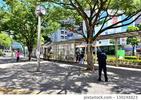 The bus terminal in front of Funabori Station on the Toei Shinjuku Line on a scorching hot day The bus terminal in front of Funabori Station on the Toei Shinjuku Line on a scorching hot day 130248823