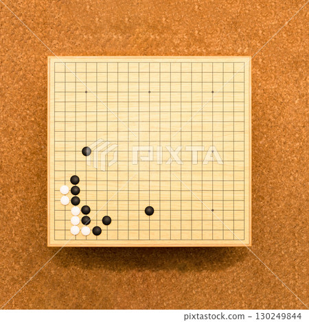 Go is a board game that is said to have originated in China. [Image of a Go game] 130249844