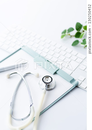 Blue binder and stethoscope 130250452