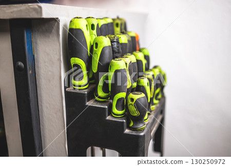 Screwdrivers Set At The Mechanic Workbench In The Garage 130250972