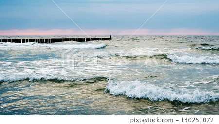 Amazing Panoramic View Of Waves Running Of The Sea Water On A Beach 130251072