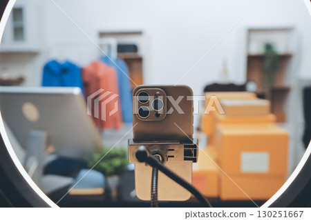 Portrait of Starting small businesses SME owners, two Asian woman check online orders Selling products working with boxs freelance work at home office, sme business online small medium enterprise 130251667