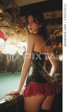 Elegant woman in a corset posing at a vintage bar with soft lighting during the evening hours in Korea Elegant woman in a corset posing at a vintage bar with soft lighting during the evening hours in Korea 130252311