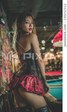 Korean performer in a playful outfit poses confidently in a lively bar with vibrant decor at night Korean performer in a playful outfit poses confidently in a lively bar with vibrant decor at night 130252312