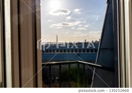 Stunning view from the window of the Eiffel Tower and roofs of houses 130252668