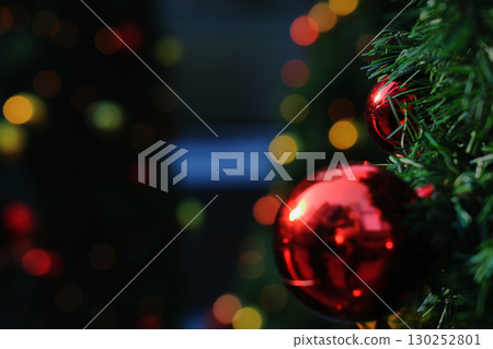The city at night on New Year's Eve, with the lights of Christmas tree decorations sparkling 130252801