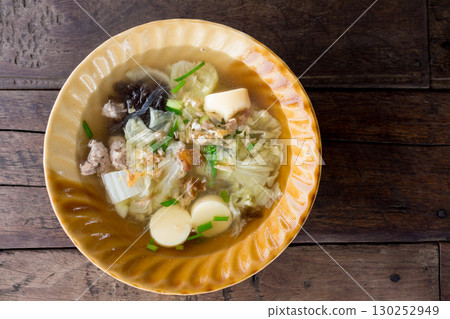 Mixed vegetable soup in a bowl placed on the table Mixed vegetable soup in a bowl placed on the table 130252949
