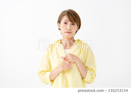 Middle-aged woman portrait worried Middle-aged woman portrait worried 130253234