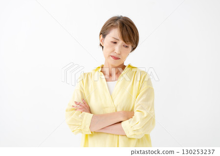 Middle-aged woman portrait worried Middle-aged woman portrait worried 130253237