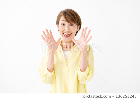 Middle-aged woman portrait surprised 130253245
