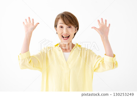 Middle-aged woman portrait surprised 130253249