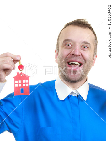 Man holding home keys 130253452